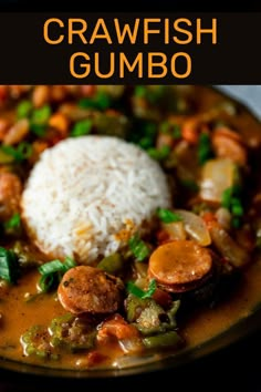 a bowl filled with stew and rice on top of a table