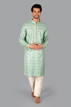 Blue kurta with woven floral jaal motifs. Comes with pant. - Aza Fashions Designer Meenakari Jamawar Kurta, Bollywood Style Straight Kurta With Meenakari, Designer Meenakari Kurta For Diwali, Eid Meenakari Straight Kurta Traditional Wear, Diwali Straight Kurta With Meenakari Details, Meenakari Straight Kurta For Diwali, Diwali Meenakari Straight Kurta, Festive Straight Kurta With Meenakari Detailing, Straight Kurta With Meenakari For Eid