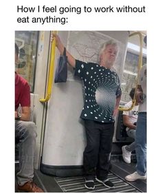 an older man standing on a subway train with his hand up to the side of it