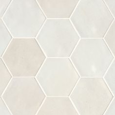 a white hexagonal tile pattern that looks like hexagon tiles