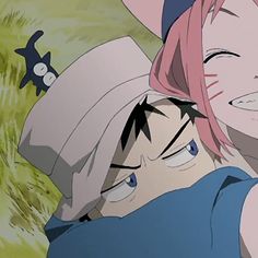 two anime characters hugging each other in the grass