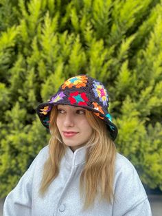 Item Information *Crochet Floral Bucket Hat *You can clean it in wash machine at 30 degrees. *If you have any questions you can contact us. (Customization,size, shipping etc.) Welcome to AlisdaKnit!  We started our journey with my mother we opened a little Instagram page called @alisdaknit for handmade, knitted clothes, crochet clothes; from now on we just started to sell in Etsy. You can find different kinds of designed clothes in our page. Our location is İzmir/ Turkey, but we can ship worldwide. Shipping Information Our page is using express shipping. Delivery Time for Turkey is around 1-3 days, 3-7 days for USA, Canada and 3-7 days for Europe Continent. Shipping is Free Extra Information Contact us for different designs that you desire and if you are seeing an item that out of stock yo Multicolor Yarn Mini Hat One Size, Multicolor Crochet Hat For Spring, Multicolor Crochet Beanie Hat, One Size Multicolor Crochet Hat, Retro Multicolor Crochet Hat For Spring, Multicolor Crochet Cap Hat, Multicolor Crochet Cap One Size, Multicolor Crochet Cap, Multicolor Brimmed Mini Hats In Yarn