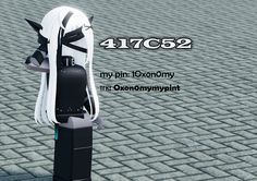 a black and white clock on the side of a brick road with text above it that reads, 4162 my pin oxonomy