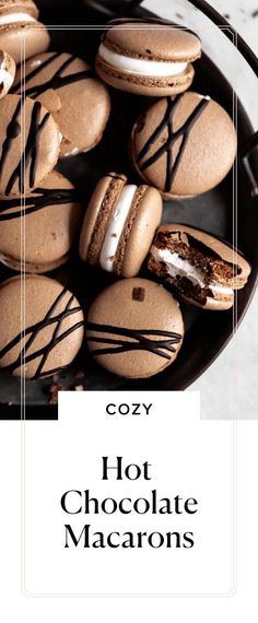 cookies with chocolate drizzled on them and the words cozy hot chocolate macarons