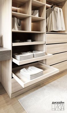 an organized closet with folded white sheets