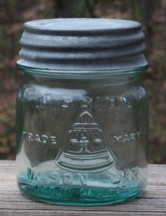 a mason jar sitting on top of a wooden table