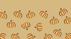 an image of many pumpkins in the middle of a pattern on a beige background