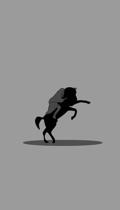 the silhouette of a horse is shown in black and white, against a gray background