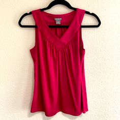 Nwot. Beautiful Red Silky Satin Sleeveless Blouse With Hidden Side Zip. Pair It With A Blazer For The Office Then Slip On Some Jeans And A Leather Jacket And Transition Perfectly From Day-To-Night Women’s Size 4p (Petite) By Ann Taylor. V-neck Camisole For Work, Red Stretch V-neck Tank Top, Red V-neck Vest For Spring, V-neck Camisole For Spring Workwear, Elegant Red V-neck Tank Top, V-neck Camisole For Workwear, Fitted Red V-neck Tank Top, Red Stretch Sleeveless Blouse, Stretch V-neck Tank Top For Work