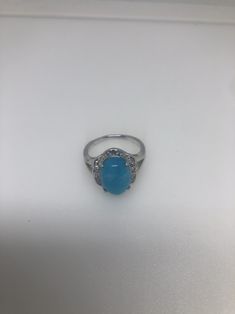 Large genuine aqua blue Larimar Vintage ring Low content silver not sterling. Size 9 My jeweler can re size it for a $10-$20 fee All rings are shipped in a nice gift box. Check out our over a THOUSAND great reviews Engraving is $4 per letter and is not always perfect depending on the piece. It can take a few days if the jeweler is busy. This is payable to Paypal Judithsltd@gmail.com Blue Aquamarine Jewelry With Center Stone, Blue Turquoise Ring For Promise, Fine Jewelry Style, Elegant Blue Turquoise Ring With Center Stone, Fine Jewelry Aquamarine Ring In Turquoise, Fine Jewelry Blue Turquoise Ring For Anniversary, Gift Turquoise Topaz Ring With Center Stone, Turquoise Blue Topaz Ring, Blue Cabochon Ring In Fine Jewelry Style, Fine Jewelry Turquoise Ring With Accent Stones In Silver