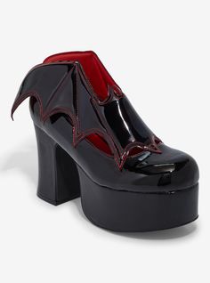 Sink your fangs into these black Vampira heels! Featuring bat wing appliqué detailing and red contrast stitching. Listed in women's sizes.Platform: 2''Heel: 4''Polyurethane upper; rubber soleImported Gothic Black Heels For Night Out, Black Punk Heels For Halloween, Halloween Platform Heels With Pointed Toe, Edgy Black Heels For Halloween, Gothic Black Heels For Halloween, Black Platform Heels For Halloween, Black Heels For Halloween Party, Gothic Platform Heels For Halloween, Black Round Toe Heels For Cosplay