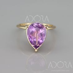 ✿ THE JEWEL 14k solid gold natural pear cut Amethyst engagement ring. A remarkable, and bold rose gold, oval cut solitaire ring set with a natural Amethyst. Pear cut Amethyst ring, no one can ignore. If you are looking for something exceptional, this ring is for you! ✿ THE LITTLE DETAILS... Your ring will be handmade form 14k (or 18k) gold. Ring's width is 1.5mm. The center stone size is 14mm x 9mm. Weight 4.80ct ** Please note since I use natural gems, variation in color and clarity from the listing photos. ✿ HOW FAST CAN I GET IT? It will take me about 7 days to craft your ring and set all the gems in place. Then you can choose between 3 types of shipping methods: ✧ Registered (about 3 weeks) - FREE ✧ Expedited (5 -10 business days) - $15 ✧ Express (3-7 business days) - $30 ✿ MAKE IT PER Elegant Lavender Amethyst Ring In 14k Gold, Purple Pear-shaped Amethyst Ring With Prong Setting, Elegant Teardrop Amethyst Ring, Pear-shaped Purple Amethyst Ring With Prong Setting, Purple Teardrop Fine Jewelry Ring, Fine Jewelry Purple Teardrop Ring, Elegant Purple Teardrop Amethyst Ring, Fine Jewelry Teardrop Purple Ring, Elegant Teardrop Amethyst Gemstone Ring