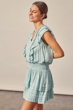 Introducing our Pleated Detail Dress, a charming and stylish addition to your wardrobe. This dress features a smocked waistband that adds comfort and a flattering fit. The pleated skirt creates a graceful and elegant look, while the ruffle detailing adds a touch of whimsy and playfulness to the design. With its versatile and fashionable design, it's perfect for a variety of occasions. Size + Fit - Model is wearing size S- Measurements taken from size S- 5'9" / 175CM- 32-24-34 Style: Boho Print /