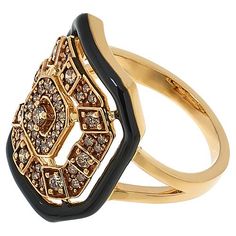 Rarities 1/2ctw Champagne Diamond and Black Enamel Art Deco Ring Step back in time with this stunning Art Deco-inspired ring. With its black enamel border and sparkling champagne diamonds, it's a true work of art that captures the glamour and sophistication of a bygone era. Whether you're a lover of vintage fashion or simply looking to add timeless elegance to your collection, this ring is sure to inspire.       Approx. 1-3/4"L x 5/16"W     Stamped .925 sterling silver; gold and brown rhodium plating; black enamel   Stone Information       All sizes and weights approximate     Champagne Diamond - Round; 1/2ctw  - ranges from 0.47ctw to 0.56ctw Elegant Enamel Diamond Ring, Elegant Black Enamel Ring, Elegant Gold Diamond Ring With Enamel, Elegant Black Enamel Diamond Ring, Luxury Enamel Rings With Diamond Accents, Luxury Enamel Rings For Formal Occasions, Elegant Diamond Ring With Enamel, Elegant Black Enamel Diamond Ring For Anniversary, Elegant Yellow Gold Enamel Ring With Diamond Accents