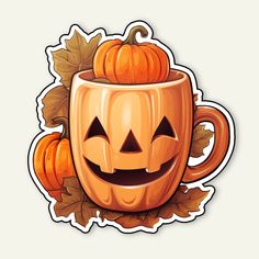 a pumpkin mug with two jack - o'- lanterns on the side and leaves around it