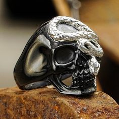 Black Metal Skull Ring Symbolic Style, Symbolic Black Metal Skull Ring, Gothic Black Rings With Skull Print, Black Stainless Steel Skull Ring For Halloween, Black Metal Skull Ring, Black Stainless Steel Skull Ring, Halloween Skull Rings Symbolic Style, Halloween Black Skull Print Rings, Black Symbolic Skull Ring For Halloween