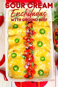 an enchilada casserole with red peppers and jalapenos