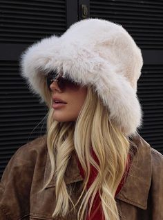 Fluffy hat Plush bucket design, short soft brim, faux fur material Fully lined 100% polyester Cold hand wash Fancy Bucket Hat, Fall Hats Women, Oversized Fur Hat, White Fluffy Headband, Fluffy Hats Aesthetic, Faux Fur Headband Outfit, Denver Colorado Aesthetic Outfits, Ugg Clothes, Faux Fur Hat Outfit