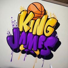 graffiti art on the side of a building that says king james with a basketball in it