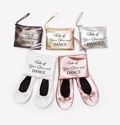 four pairs of ballet shoes with their names on them and one pair of dance slippers