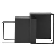 three black tables sitting next to each other