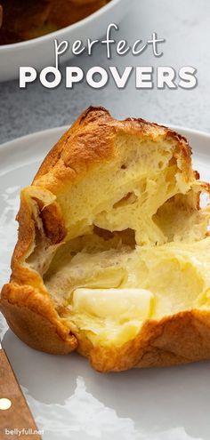 a close up of a pastry on a plate with the words perfect popovers above it