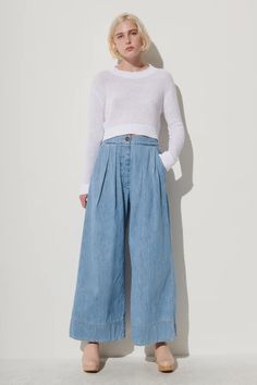 Easy, pleated high-waist, wide-leg trouser, cut this season in Lightweight Denim. 100% Cotton Faux front button. Invisible side zip. Elastic waistband at back Side slip pockets Made in USA See size guide Need help finding your size? Chat with us. Workwear Wide-leg Jeans With Elastic Waistband, Chic Wide Leg Pants For Elevated Casual Occasion, High Waist Wide Leg Pants For Spring, High Waist Wide Leg Pants For Spring Smart Casual, High Waist Wide Leg Pants For Elevated Casual Spring, Wide Leg Pants For Fall Daywear, Casual Culottes With Belt Loops, Relaxed Fit Straight Leg Culottes With Pockets, Casual Wide-leg Culottes With Belt Loops