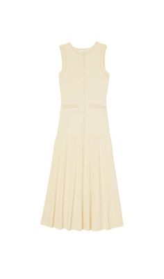 This versatile dress features a flattering sleeveless design and a comfortable knit fabric, perfect for any occasion. Transition effortlessly from day to night and feel confident and stylish all day long. Round neck Sleeveless Front beaded button closures Flared hem Lower main fabric: 80% viscose/20% polyamide; upper main fabric: 52% viscose/46% polyamide/2% elastane Hand wash or dry clean Colour may vary due to lighting on images. The product images (without model) are closest to the true colou Elegant Knit Sleeveless Dress For Spring, Summer Stretch Dresses With Buttons, Spring Viscose Fitted Sleeveless Dress, Spring Fitted Sleeveless Viscose Dress, Fitted Viscose Sleeveless Dress For Spring, Summer Knit Midi Dress For Daywear, Summer Knit Dresses For Work, Knit Summer Workwear Dresses, Summer Knit Workwear Dresses