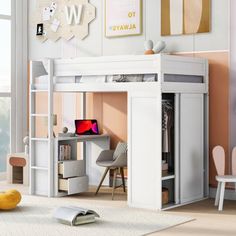 a white loft bed with desk underneath it