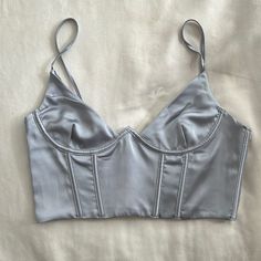 Super Cute Just Doesn’t Fit Me Properly. Best For Smaller Chest (Up To A B/C Cup). I Wear A 32ddd And It Does Not Fit Me. New With Tags. Elegant Silver Crop Top For Summer, Fitted Crop Top With Built-in Bra And Underwire, Fitted Silver Crop Top For Summer, White Tops With Built-in Bra And Underbust Shape, Silver Fitted Crop Top For Night Out, Spring Sleeveless Bra-friendly Corset, Fitted Silver Cropped Top, Silver Cropped Fitted Top, Fitted Silver Sleeveless Crop Top