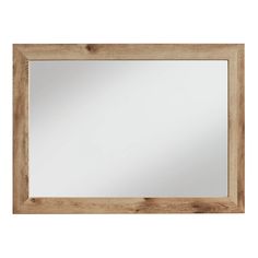 a wooden frame mirror on a white wall