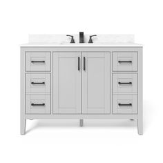 a white bathroom vanity with two sinks and no faucets on the counter top