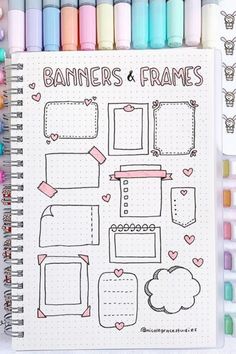 a notebook with markers and frames on it