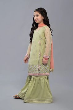 Long Dress for Girl and Gharara Description3 PieceShirt fabric OrganzaTrouser fabric SatinDupatta fabric ChiffonEmbroidered panni work angrakha paired with gharara and chiffon dupatta. Green Long Sleeve Dress For Diwali, Green Sharara With Dabka Work For Eid, Green Dabka Dress For Diwali, Eid Green Sharara With Dabka Work, Pista Green Self Design Dress For Eid, Green Dabka Sets For Eid, Fitted Green Sharara For Eid, Eid Green Sharara With Chikankari Embroidery, Green Self Design Sets For Eid