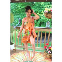 Details & Care - Ethically sourced from artisans all over the world, eco friendly. - Orange metallic color - Sarong - Sequins - Embroidered - One size fits most (XS - XL) | 0 - 14 - 100% cotton - Hand wash in cold water. Hang to dry. Size Info Runs True To Size One size fits most (XS - XL) | 0 - 14 Need help knowing your size? Use our size guide. Model Measurements Model is: Size: 4/6 Height: Just shy of 5'1" Weight: 125 lbs Over bust: 36.5" Under bust: 31.5" Waist: 30 1/2" Hips: 35 1/2" Traditional Summer Sarong For Vacation, Traditional Summer Vacation Sarong, Traditional Summer Cotton Sarong, Traditional Cotton Sarong For Summer, Summer Beachwear Sarong With Batik Print, Summer Vacation Sarong With Batik Print, Summer Vacation Batik Print Sarong, Summer Bohemian Batik Print Sarong, Summer Festival Batik Print Sarong