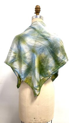 Dyed with natural dyes Hand-rolled edges 100% silk Cool and luxurious to the touch. Dimensions: 32 x 32" Have fun and learn 4 ways to style this scarf on the blog. Also, check out our blog post about silk scarves as a fall fashion trend. Green Silk Square Scarf, Hand Dyed Silk Scarf, Dye Colors, Square Silk Scarf, Hand Dyed Silk, Green Item, Organic Fabrics, Fall Fashion Trends, Beautiful One