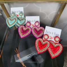 Perfect for Valentine's Day, or add a little heart to your rodeo outfit.So lightweight, you'll forget you are wearing them!LightweightHandmadeLead and nickel compliant Pink Heart-shaped Beaded Earrings For Parties, Bohemian Heart-shaped Party Earrings, Pink Beaded Heart Earrings For Party, Red Heart Beads Jewelry For Summer, Heart-shaped Summer Party Jewelry, Heart Shaped Summer Party Jewelry, Summer Party Heart-shaped Jewelry, Summer Heart Shaped Jewelry With Heart Beads, Adjustable Heart-shaped Beaded Earrings