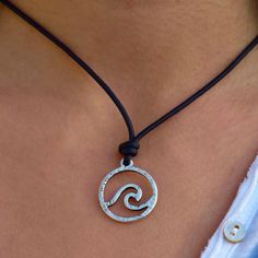 Whether you're hitting the waves or soaking up the sun, this Surfing Jewelry adds a touch of beach-inspired charm to any outfit. Treat yourself or surprise a surfer friend with our  Cool Surfer Wave Pendant Necklace. This unique Ocean Wave Jewelry is perfect for surf enthusiasts and beach lovers alike as a thoughtful summer gift for surfers P R O D U C T ∙ D E T A I L S * round leather 2mm in several colors to choose * wave charm25mm in zamak sterling silver plated * button clasp in zamak sterli Casual Beach Jewelry With Adjustable Cord, Trendy Jewelry With Adjustable Cord For Vacation, Coastal Jewelry For Beach Party, Casual Jewelry For Beach Party Season, Adjustable Ocean Color Necklace For Beach, Adjustable Strand Jewelry For Beach, Beach-ready Adjustable Silver Jewelry, Adjustable Cord Strand Jewelry For The Beach, Summer Beach Necklaces With Adjustable Length