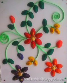 an art project made out of plastic flowers