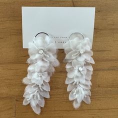 A.B. Ellie Organza Floral Statement Earrings - 3.5-4" In Length - 1/5" Wide At Top Gradually Tapers At Ends - Organza Petals - Sea Bead And Rhinestone Detail - 925 Sterling Silver Posts - Hand Made From 2018 Collection Never Been Worn, Full Original Packaging Included, New With Tags Great For The Anti-Bride Or Any Special Occasion Elegant White Flower Earrings For Celebration, White Flower Earrings For Celebration, Delicate White Chandelier Earrings For Formal Occasions, White Chandelier Earrings For Anniversary, Delicate White Earrings For Evening, White Flower Bridal Earrings For Formal Occasions, Elegant White Bridal Earrings For Celebration, Alexis Bittar Earrings, Juicy Couture Earrings