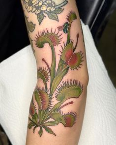 a woman's leg with flowers on it and the words, post you may like