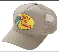 Get ready for your next fishing trip with this Bass Pro Shops hat. The adjustable snapback design ensures a comfortable fit, while the lightweight and breathable material make it perfect for any season. The solid khaki color and mesh back give it a stylish and practical look, perfect for any casual occasion. This classic snapback hat features a Bass Pro Shops logo and a variety of hunting and fishing themes, making it a must-have for any outdoors enthusiast. With its durable polyester fabric and sturdy construction, this hat is perfect for any adventure. Whether you're fishing for bass or turkey hunting, this hat is the perfect accessory to complete your look. Bass Pro Shops Hat, Bass Pro Shop Hat, Bass Pro Shop, Fishing Hat, Mesh Cap, Khaki Color, Bass Fishing, Adjustable Hat, Trucker Cap