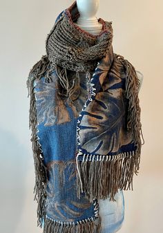 Welcome to LM Handmade Boutique! New! One of a kind hand painted scarf! Wrap yourself in this work of art! With fall vibes and bohemian style this one of a kind scarf will add a unique touch to any outfit.  MORE DETAILS: * One of a kind.  * Hand painted with freestyle gold leaves  * Upcycled denim * Crochet detail and lots of fringe  * Free shipping  This scarf makes a great gift! MORE BOHO FASHION HERE: http://lmhandmadeboutique.etsy.com/ Follow me: INSTAGRAM @lmhandmadeboutique Facebook https://www.facebook.com/LMHandmadeBoutique/ QUESTIONS? My name is Lisa, so if you have any questions about this upcycled scarf please use the message button below and I'll be more than happy to help. Thank you for shopping at LM Handmade Boutique! Denim Crochet, Boho Crochet Patterns, Wearable Art Fashion, Fall Scarf, Leaf Scarf, Hand Painted Scarves, Crochet Mandala Pattern, Fabric Scarf, Painted Scarf