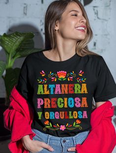 Altanera, Preciosa y Orgullosa shirt, Latina shirt, Regalos en español, Mexican shirt, Spanish shirt, Regalos para Mama This classic unisex jersey short sleeve tee fits like a well-loved favorite. Soft cotton and quality print make users fall in love with it over and over again. These t-shirts have-ribbed knit collars to bolster shaping. The shoulders have taping for better fit over time. Dual side seams hold the garment's shape for longer.  .: 100% Airlume combed and ringspun cotton (fiber cont 16 De Septiembre Outfit Ideas, Mexican Shirt, Mexican T Shirts, Mexico Shirts, Spanish Shirts, Mexican Shirts, Cute Shirt Designs, Cute Shirts, Diy Clothes