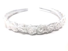 White Satin Headband Hairband Alice Band with White Flowers This white satin headband is hand decorated with small white satin flowers all the way round the headband  The size of each flower is approximately 1.5cm  It is perfect for bridesmaids, flower girls or special occasions As the headband is plastic covered with satin, it is comfortable and adjusts to fit most head sizes, from very young children to adults As this item is handmade, if you require something specific, please send us a messag White Satin Headband, Flower Girl Hair Accessories, White Bridesmaid, Turquoise Glitter, Satin Headband, Bridesmaid Hair Accessories, Glitter Flowers, Flower Girl Hairstyles, Feather Fascinators