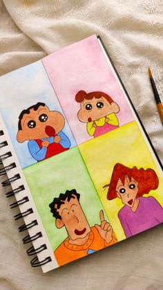 a notebook with four different colored cartoon characters on it and a pencil next to it