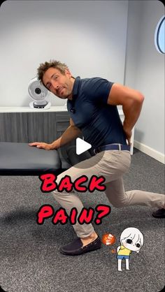 a man is dancing in an office with the caption back pain?