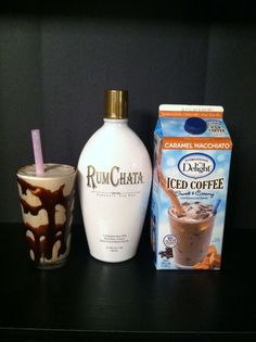 a bottle of rumchata, iced coffee and milkshake on a table