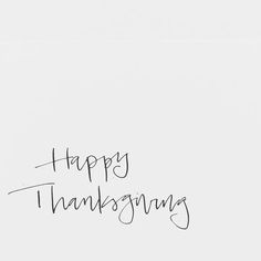 a black and white photo with the words happy thanksgiving written in cursive writing