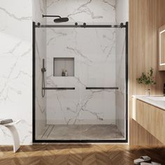 a bathroom with a walk in shower next to a sink